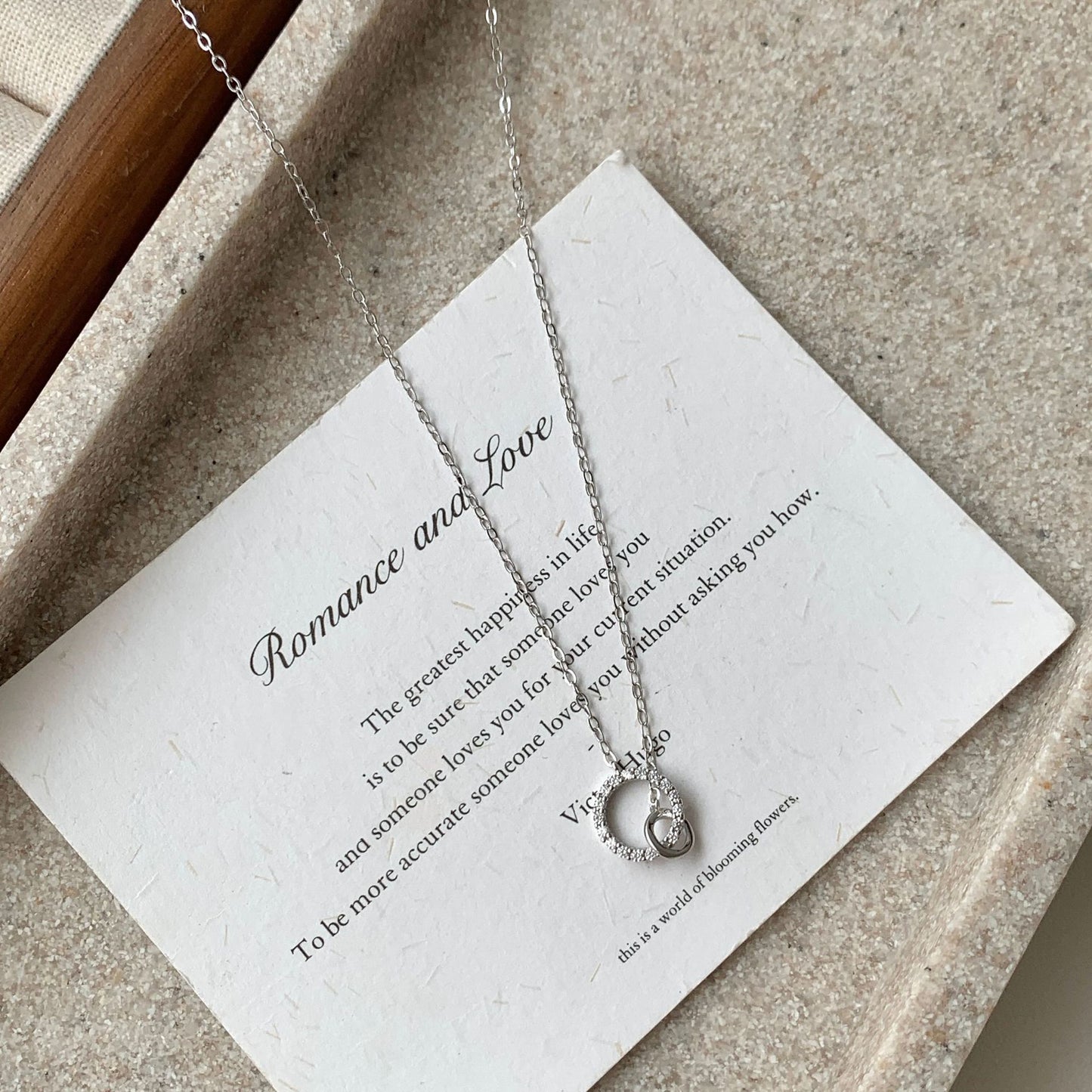 COLLIER AGT RH OZ ANNEAUX ENTRELACES