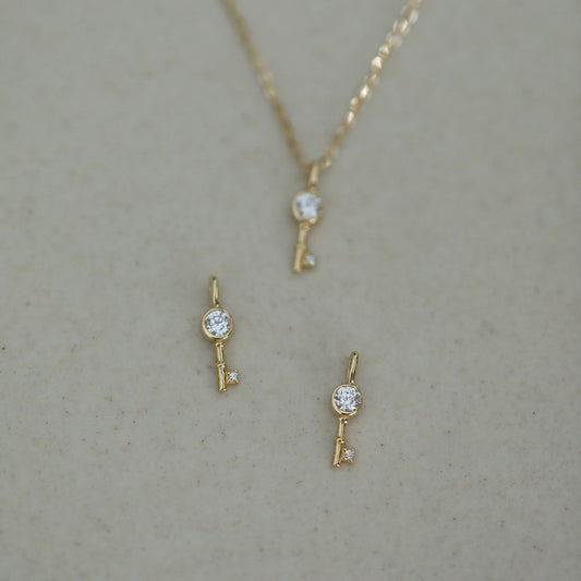 COLLIER AGT GOLD OZ CLE