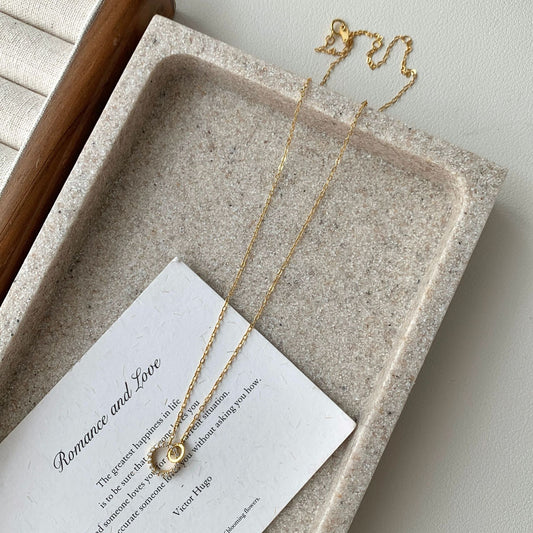 COLLIER AGT RH GOLD ANNEAUX ENTRELACES